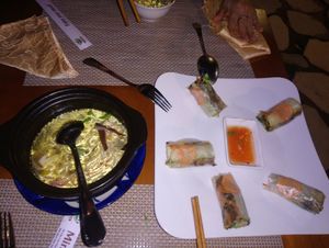 "bún tộ" (sweet & sour noodle served in clay pot - very tasty) & "ram tươi" (fresh rolls) at Minh Hien 3 in Hoi An