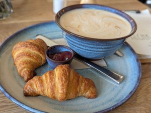 French breakfast. Small vegan croissant with big milkcoffee. at Milchkaffee in Berlin