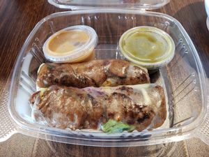 Spring rolls with veggie beef, peanut sauce, and pina grenada sauce at DD MAU in Maryland Heights