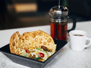 Curry chickpea salad with pita. Vegan curry dressing. Photo:Feast magazine at Alamo Drafthouse Cinema in Springfield