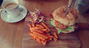 Chickpea Burger with sweet potato fries at Nourishing the Soul Cafe in Dudley Park