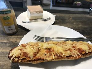 baked pizza sandwich and krémes at Napfenyes Cukraszat - Bajcsy Zsilinszky in Budapest