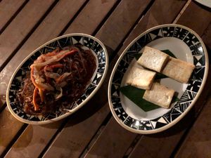 Course 4: delicious glass noodles, bland fried tofu at Feast at Lele - Luau in Lahaina