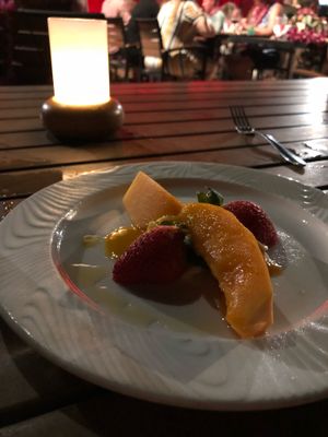 Course 5: fruit with whipped haupia. Sounds unexciting, but tastes amazing. at Feast at Lele - Luau in Lahaina