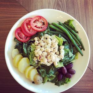 Nicoise Salad- green beans, potato, kalamata olives, tomatoes and chickpea sea salad, dressed with mustard shallot vinaigrette.  at Celesta in Milwaukee