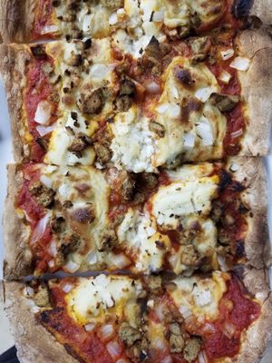 rosemary seitan sausage & onion, almond ricotta & cashew mozzarella pie - housemade pizza specials every Thursday! at Celesta in Milwaukee