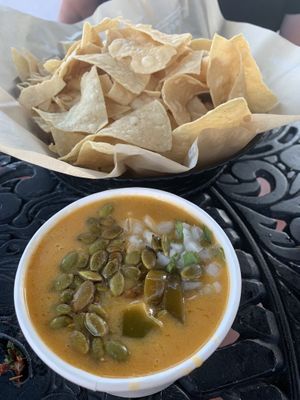 Nachos chips with planted based queso  at Sharky's Woodfired Mexican Grill in Calabasas