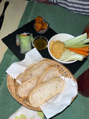Vietnamese rolls with sweet & sour sauce / fritters with yogurt / hummus, veg & bread at La Pepiniere in Florence