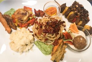 5 options tasting platter; gnocchi, vegan beef, vegan meatball, tortilla, veges at La Pepiniere in Florence