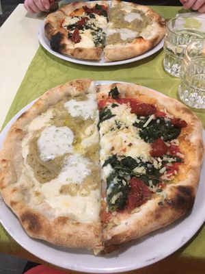 Pizzas (we halved them) Le dolce and one called something like sacletera?  at La Pepiniere in Florence