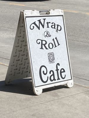 Signage at Wrap and Roll Cafe in Whitefish