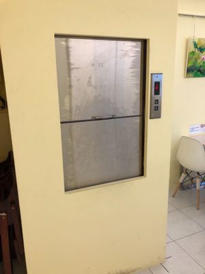 Lift to bring your food up  at Yi Fan De Huayuan - Evonne's Garden in Kaohsiung