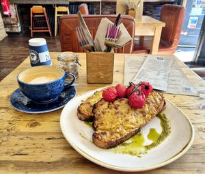 Vegan rarebit, grilled tomatoes and pesto. at Trading Post Coffee Roasters in Brighton