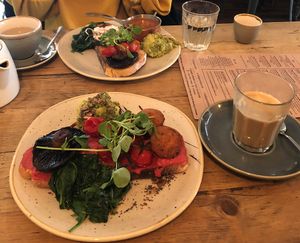 Vegan breakfast at the front, veggie breakfast at the back, ft. very tasty oat milk latte at Trading Post Coffee Roasters in Brighton