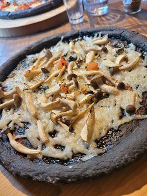 Garlic mushroom pizza w/ soy vegan cheese at Volver in Kochi