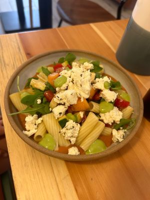 Pasta with cold tomato sauce, seasonal vegetables and feta (vegan cheese available).  at Kia Ora in Annecy