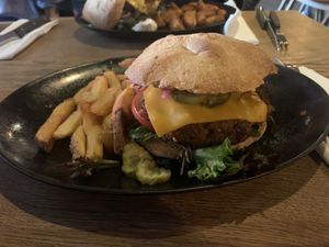 Vegan burger, I loved it, and it comes with a delicious sauce for the fries  at Cafe Vi2 in Aalborg
