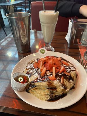 Strawberry and chocolate pancakes with a vegan peanut butter milkshake   at The Diner - Spitalfields in London