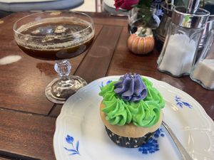 Vegan peanut butter jelly filled cupcake and an iced coffee   at Cookie Jar Cafe in Essen