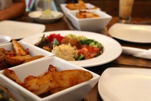 Vegan mezze with lots of delicious potato wedges... at Robertson's Organic Cafe in Tavistock