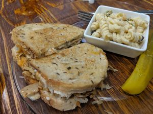 Seitan Reuben with a side of pasta salad and pickle! at 96 Lives Vegan Bakery and Cafe in Lancaster