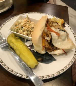 Philly cheesesteak with pasta salad  at 96 Lives Vegan Bakery and Cafe in Lancaster