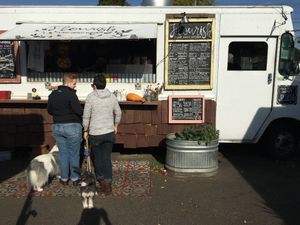 Food Truck from inside Court at Flourish Plant-Based Kitchen - Food Truck in Portland