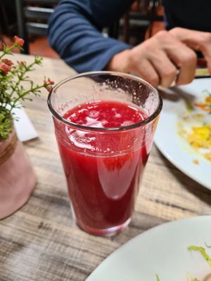Juice with menu at Verde Vital in Bogota