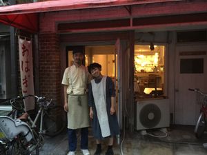 The cafe owners and front of cafe at Hobodo Cafe in Kyoto