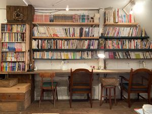 Cozy indoor setting with lots of books at Hobodo Cafe in Kyoto