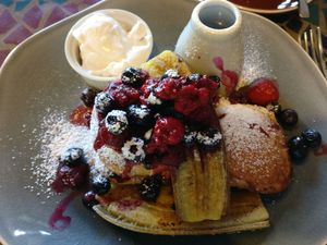 Vegan hotcakes with coconut yoghurt at The Village Larder in Woodend