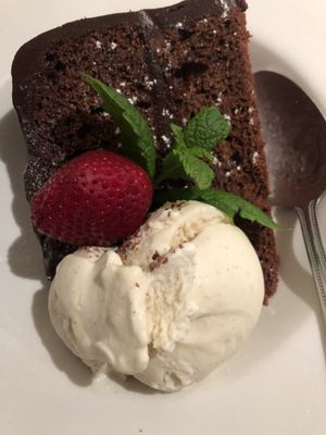 Lovely chocolate cake with dairy free vanilla ice cream!! Mmmm so tasty! at The Swan Inn in Lyndhurst