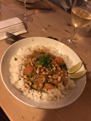 Sweet potato,  Peanut, chickpea and spinach stew with rice. This was a really fresh delicious dish!! Good  portion sizes and great flavour. at The Swan Inn in Lyndhurst
