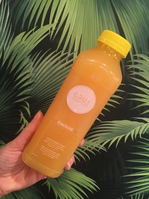 coldpressed juice : orange, carrot, citrus, vitamin b12, grenade at Crux Comptoir in Montreal