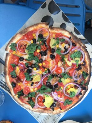 Vegan Pizza with a lot of ingredients at Yolo Pizza in Valencia
