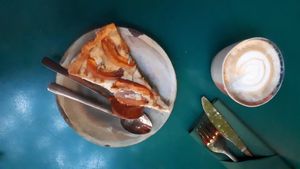 Cake and cappuccino at Eden Bistro in Warsaw