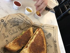  Vegan grilled cheese with tomato and avocado grilled with sunflower oil. at The Grilled Cheeserie in Nashville