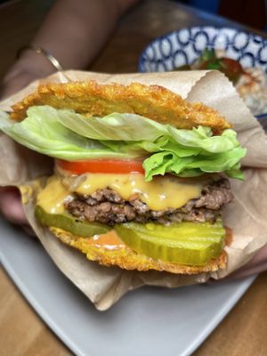 Original burger with tostones   at Jacked Up Vegan in Winter Park