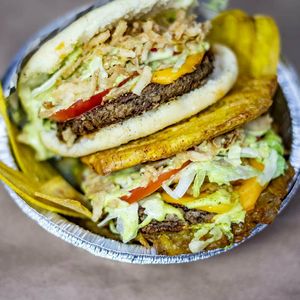 Gluten free! Guilt free! But definitely not flavor free! Arepa and tostone burgers loaded up! at Jacked Up Vegan in Winter Park