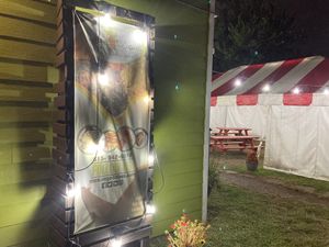 Sign and outdoor seating tent at Vegelicious in Nashville
