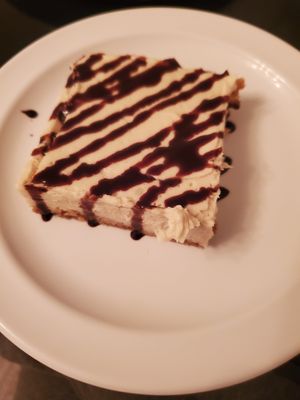 Vegan cheesecake with chocolate drizzle at Vegelicious in Nashville