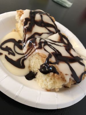 Warm white cake w/vanilla frosting and chocolate sauce.  at Vegelicious in Nashville