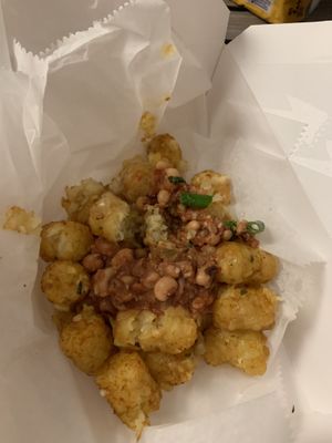Tots with house-made cheez and black-eyed pea salsa. So good   at Vegelicious in Nashville