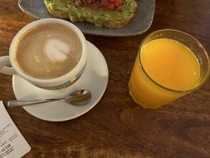 Coffee with soy milk and fresh squeezed OJ  at Alabama Cafe in San Sebastian