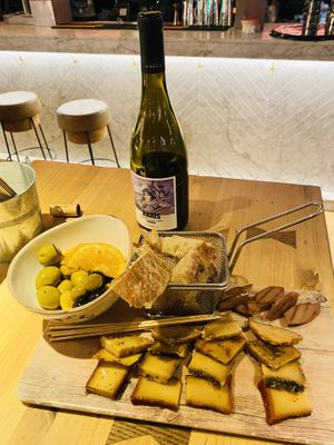 Vegan cheese plate and wine   at Amarre 69 in Barcelona