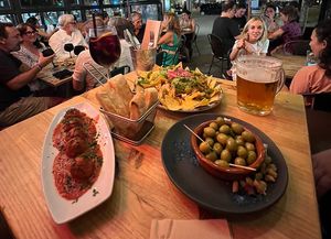 Mama Mia meatballs, nachos and olives. Sangria and beer.  at Amarre 69 in Barcelona