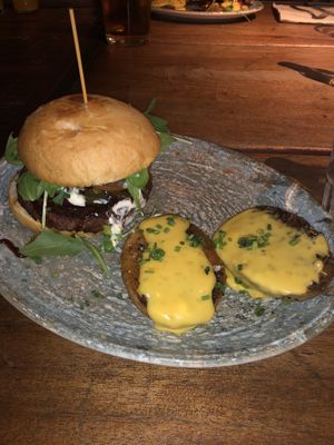 Burguer texicano, servida con patatas al horno y queso vegano por encima!  at Amarre 69 in Barcelona