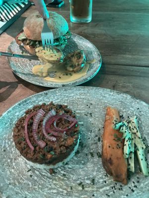 Chilli, rice, sweet potato & avocado. Chic’n burger & baked potato   at Amarre 69 in Barcelona