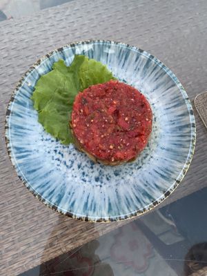 Eggplant with tomato saladd  at Old Bukhara Restaurant in Bukhara