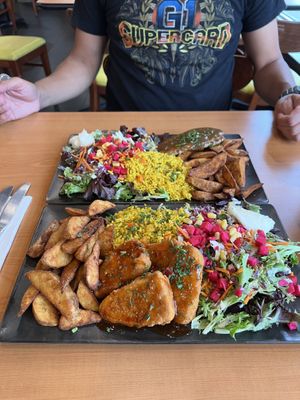 Steak platter (top) and fish platter (bottom)  at Juste Falafel in Montreal